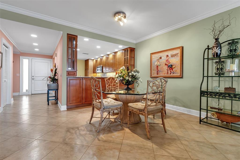 3840 Mariners Way, Unit 514A Cortez, FL 34215 - Photo 14 of 33 a dining room with furniture and kitchen view