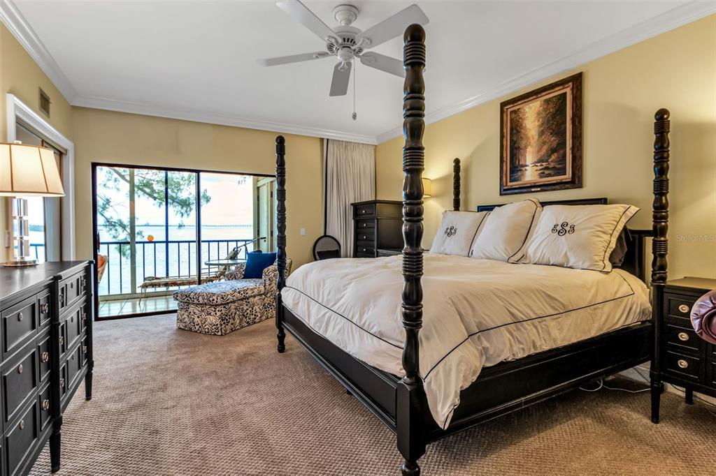 3840 Mariners Way, Unit 514A Cortez, FL 34215 - Photo 20 of 33 a bed room with a bed and a painting on the wall