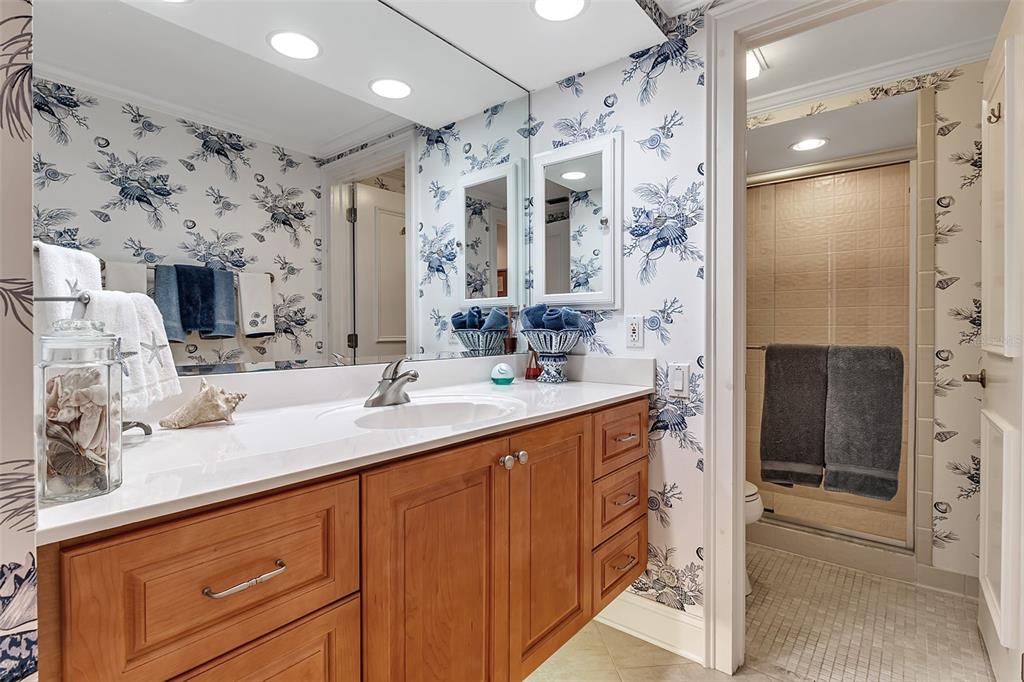 3840 Mariners Way, Unit 514A Cortez, FL 34215 - Photo 24 of 33 a bathroom with a double vanity sink mirror and shower