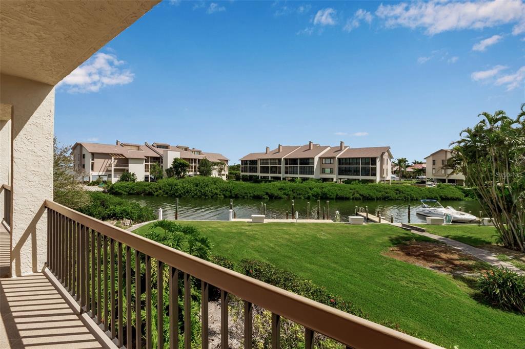 3840 Mariners Way, Unit 514A Cortez, FL 34215 - Photo 26 of 33 a view of a house with a yard from a balcony