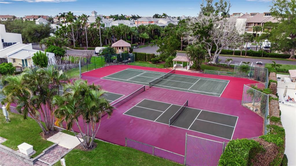 3840 Mariners Way, Unit 514A Cortez, FL 34215 - Photo 28 of 33 a view of a yard with plants and lake view