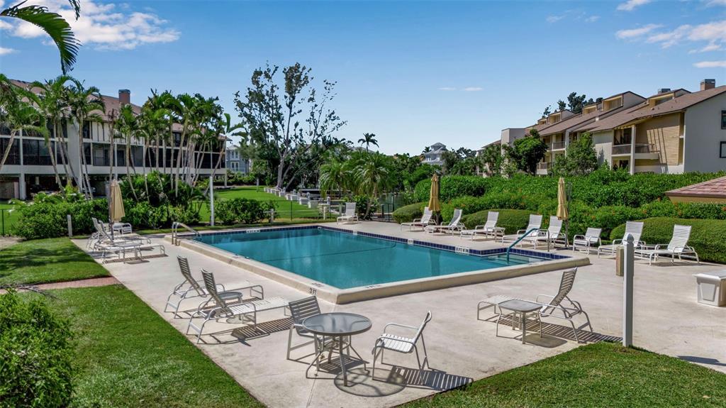 3840 Mariners Way, Unit 514A Cortez, FL 34215 - Photo 30 of 33 a view of a swimming pool with a patio