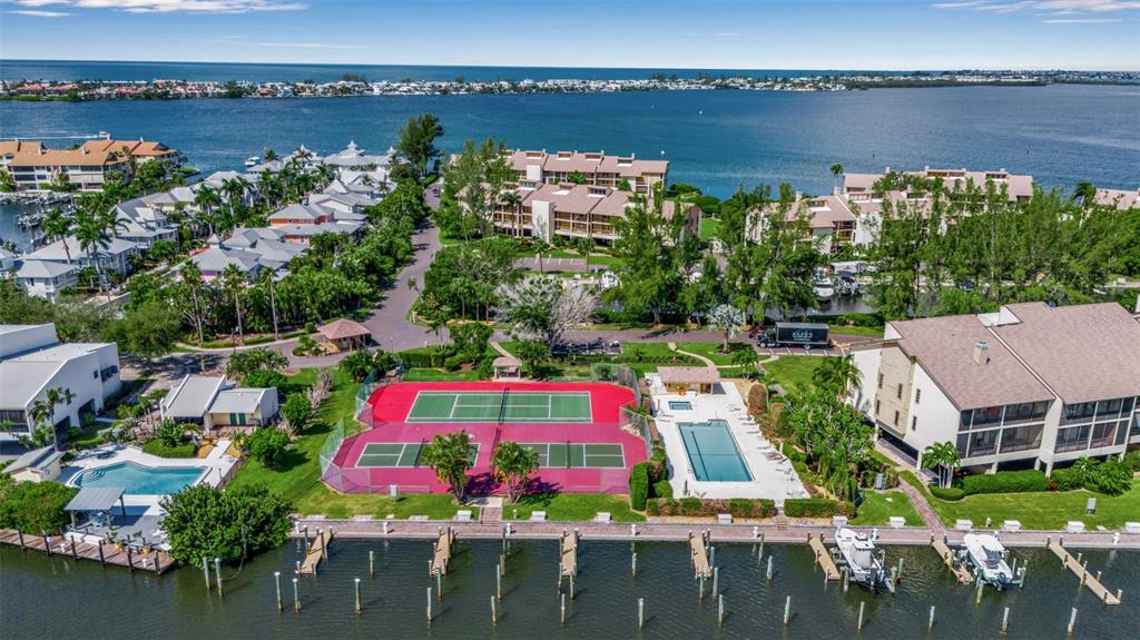 3840 Mariners Way, Unit 514A Cortez, FL 34215 - Photo 3 of 33 an aerial view of multiple house
