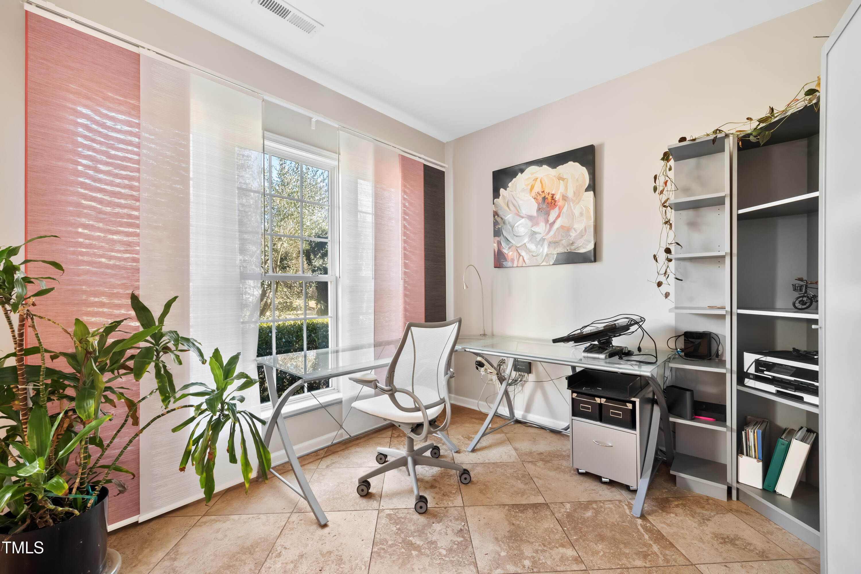7772 Silver View Lane Raleigh, NC 27613 - Photo 14 of 55 a workspace with furniture and a potted plant