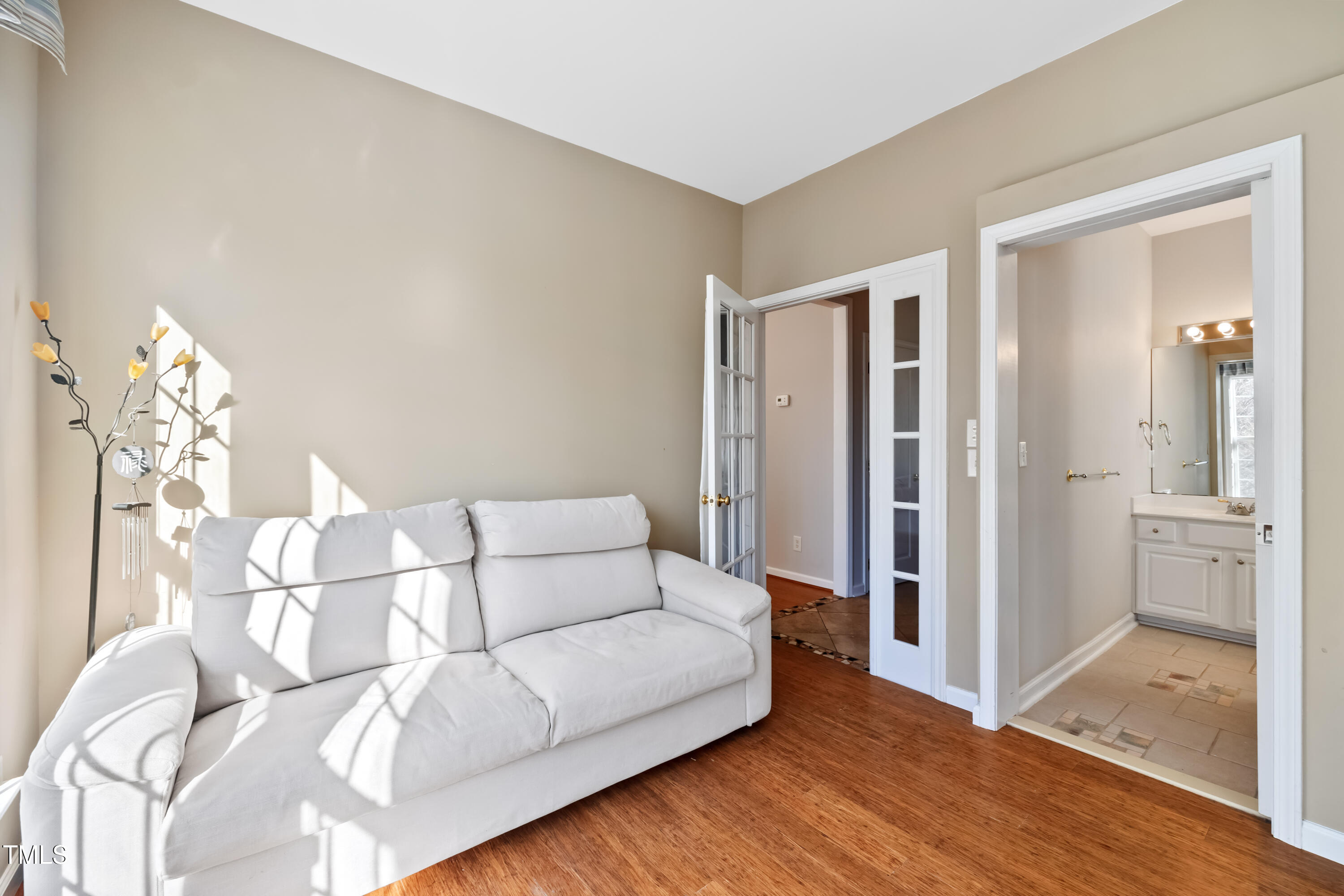 7772 Silver View Lane Raleigh, NC 27613 - Photo 16 of 55 a living room with furniture and wooden floor