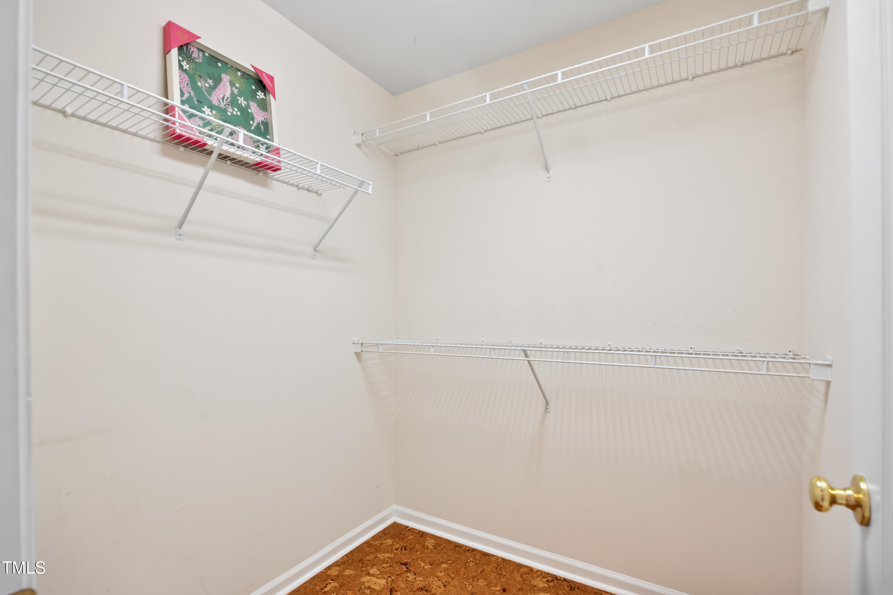 7772 Silver View Lane Raleigh, NC 27613 - Photo 24 of 55 a view of small space with racks on the wall