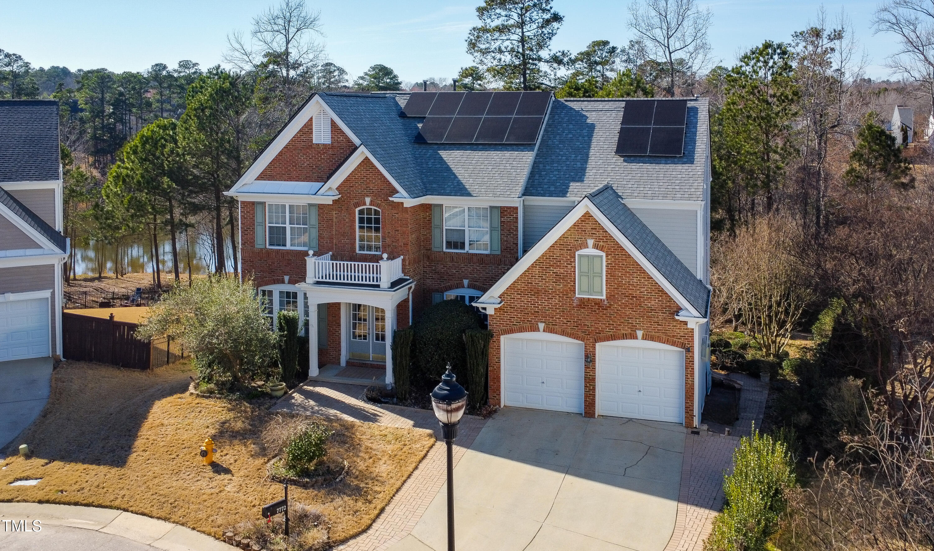 7772 Silver View Lane Raleigh, NC 27613 - Photo 42 of 55 a front view of house with yard and trees in the background