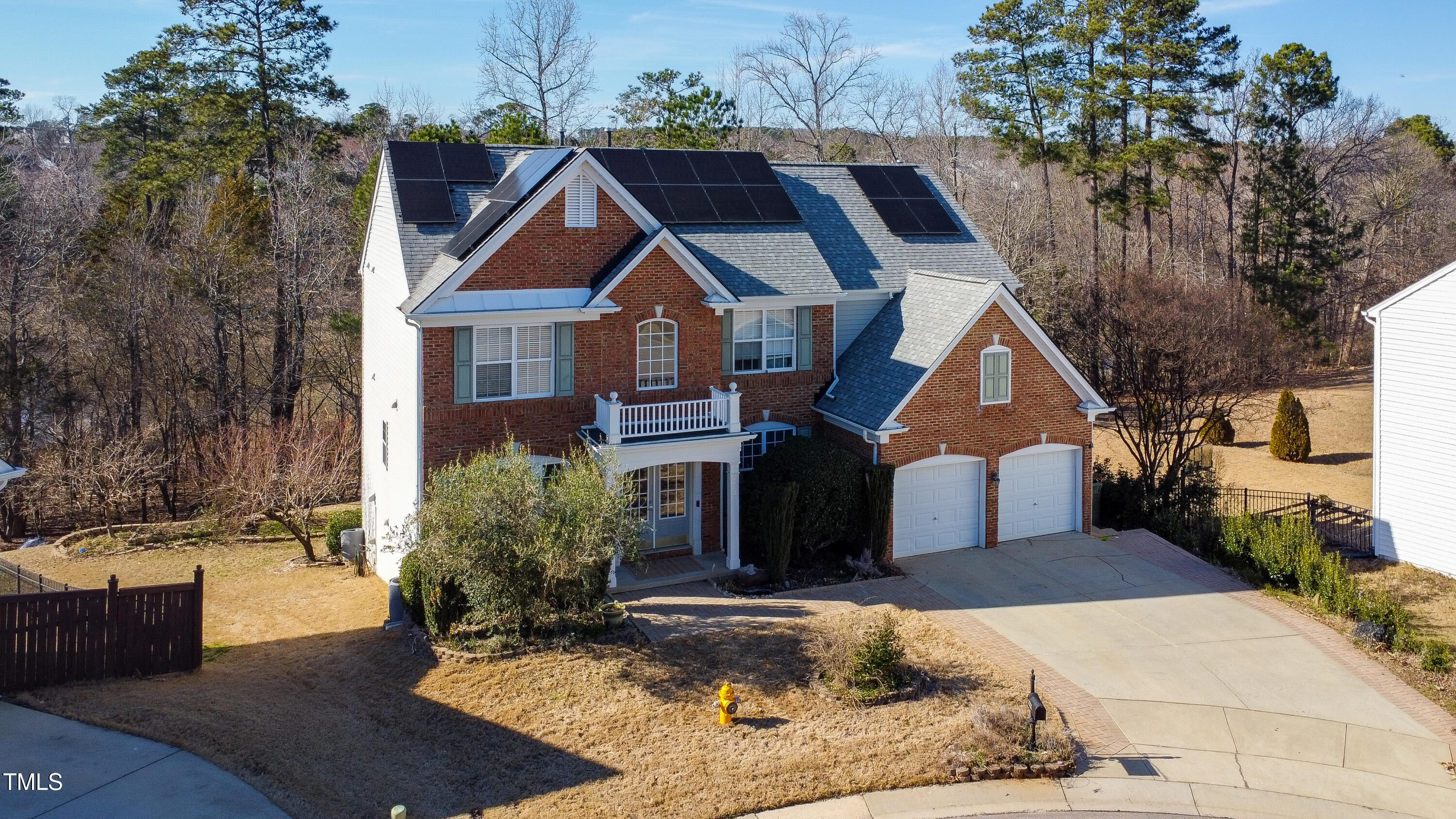 7772 Silver View Lane Raleigh, NC 27613 - Photo 43 of 55 a front view of house with yard and trees in the background