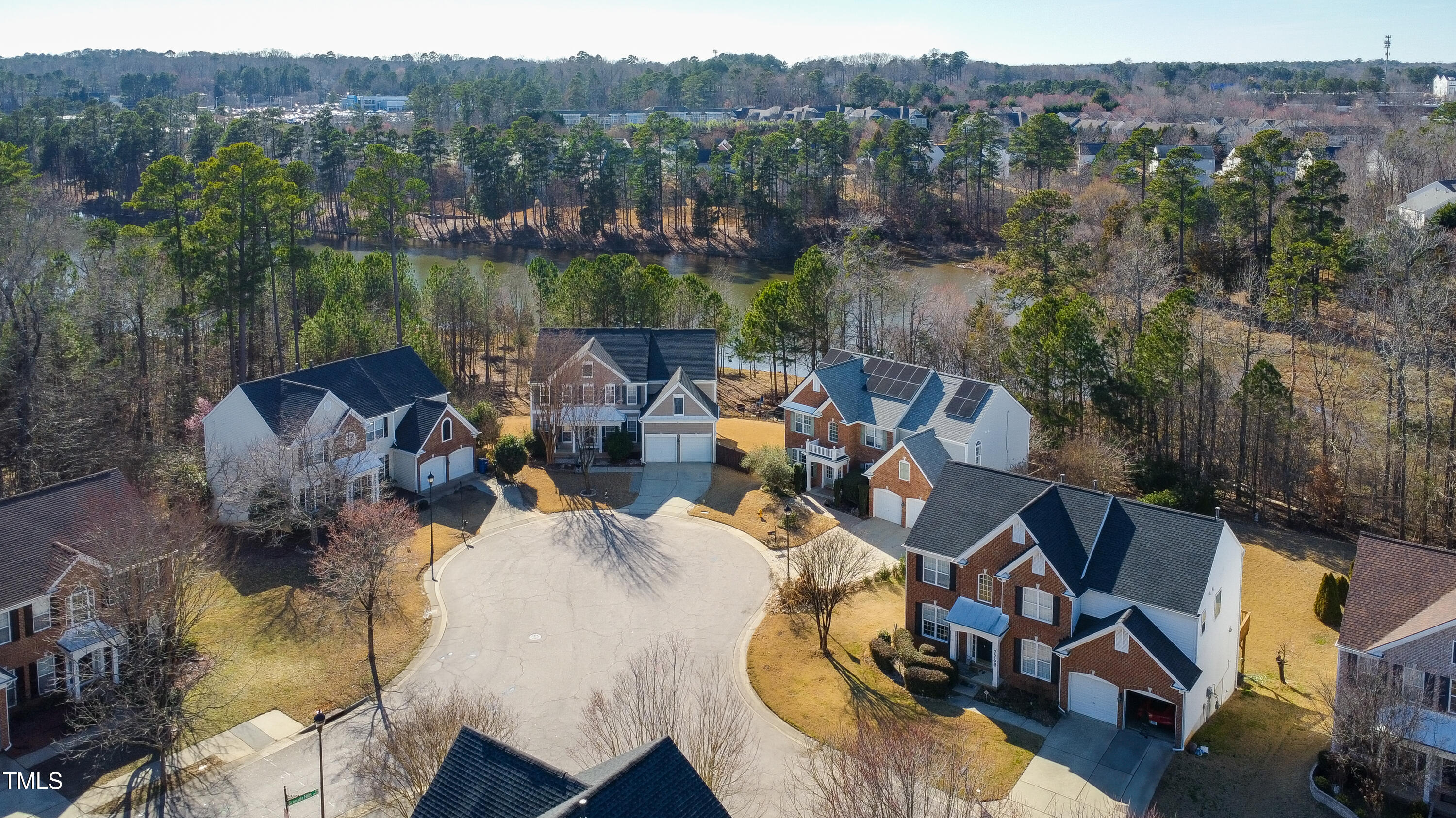 7772 Silver View Lane Raleigh, NC 27613 - Photo 45 of 55 an aerial view of a house with pool and a yard