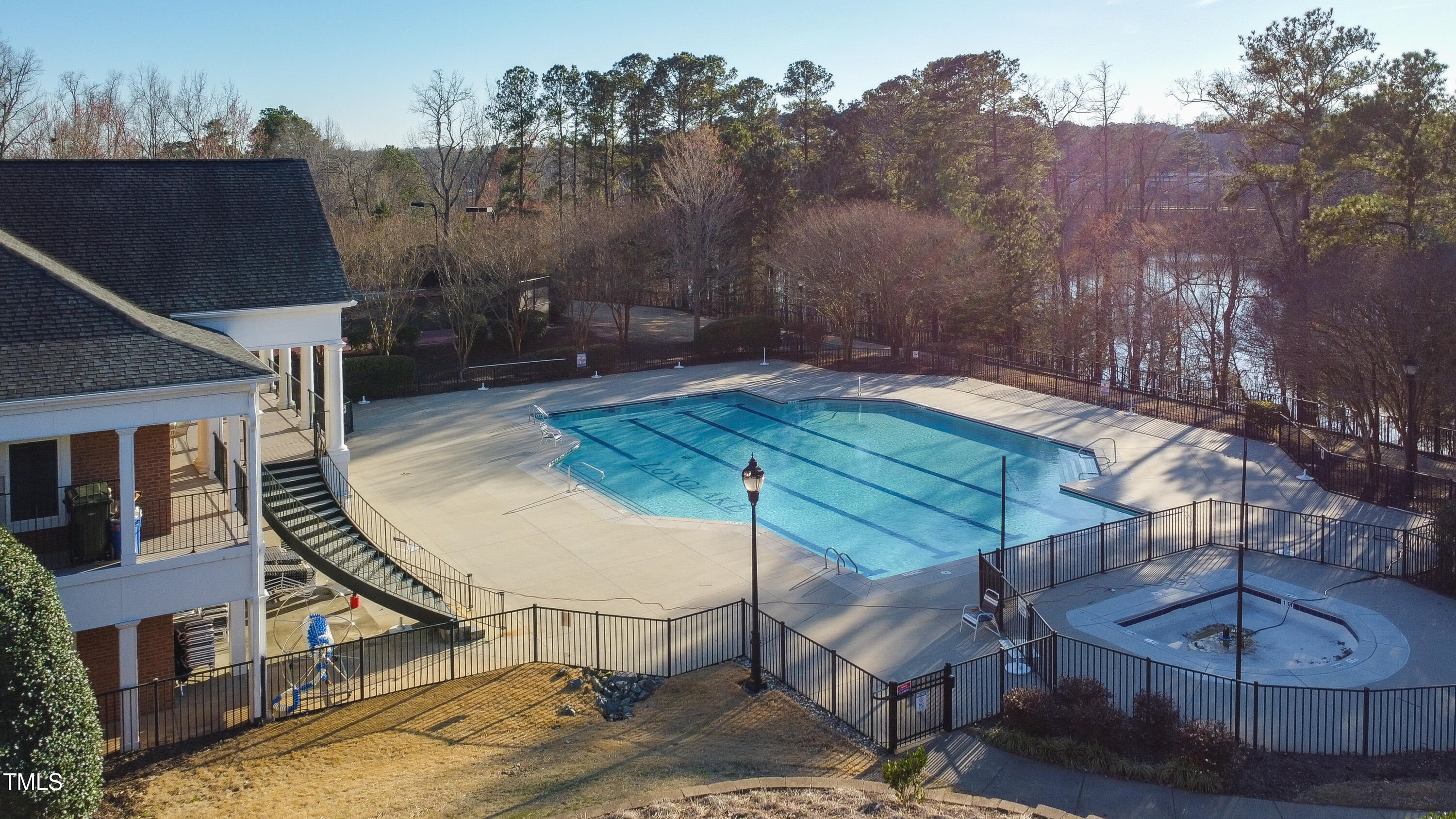 7772 Silver View Lane Raleigh, NC 27613 - Photo 49 of 55 an aerial view of a house roof deck patio and outdoor seating