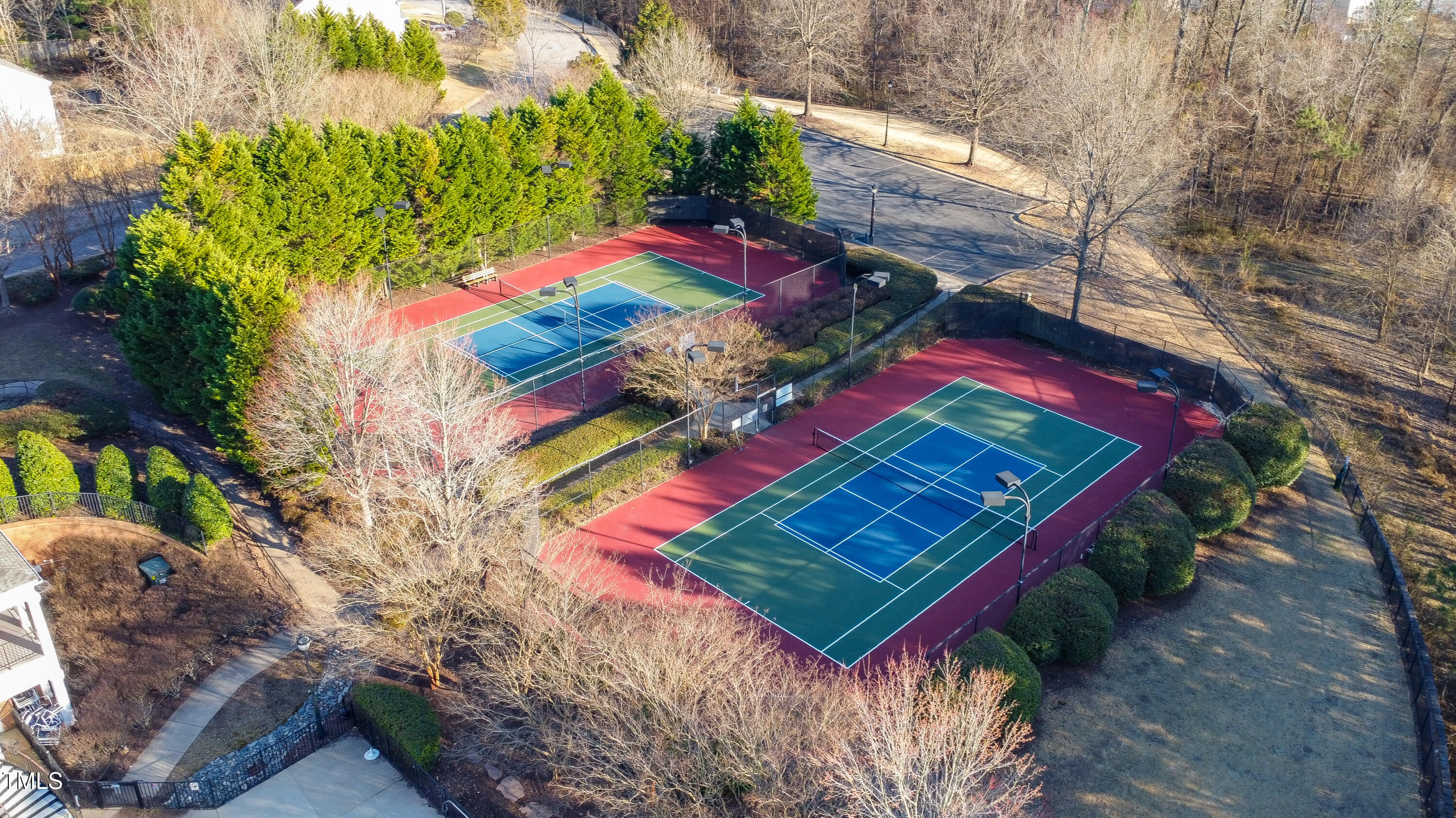 7772 Silver View Lane Raleigh, NC 27613 - Photo 53 of 55 a view of a book and a yard