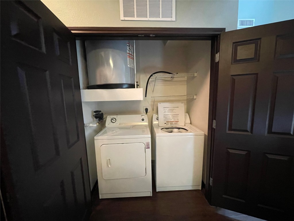 2502 Leon Street, Unit 505 Austin, TX 78705 - Photo 9 of 28 a close view of a utility room with dryer and washer