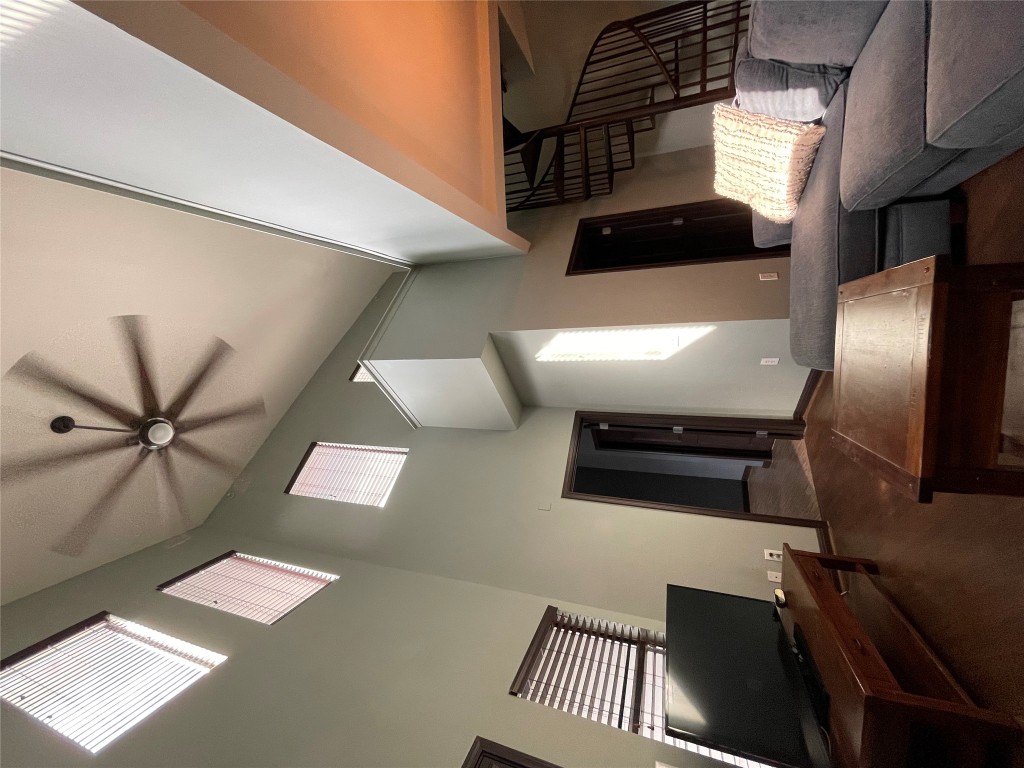 2502 Leon Street, Unit 505 Austin, TX 78705 - Photo 17 of 28 a living room with furniture and a flat screen tv