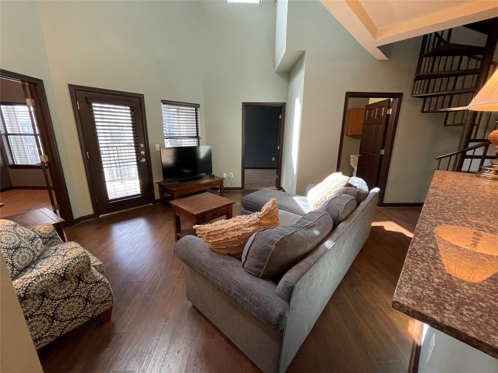 2502 Leon Street, Unit 505 Austin, TX 78705 - Photo 5 of 28 a living room with furniture and a flat screen tv