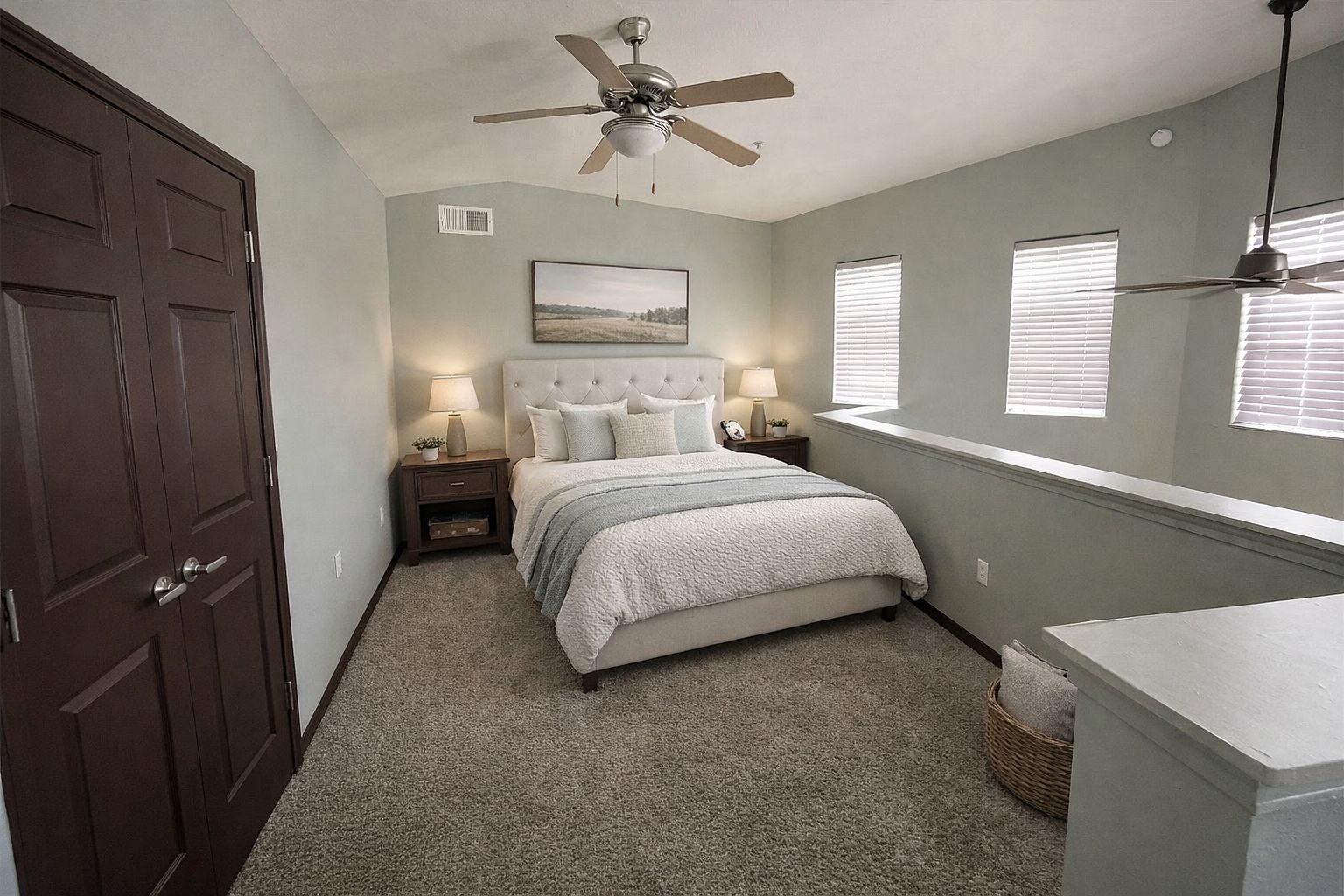 2502 Leon Street, Unit 505 Austin, TX 78705 - Photo 7 of 16 a bedroom with a bed and a chandelier