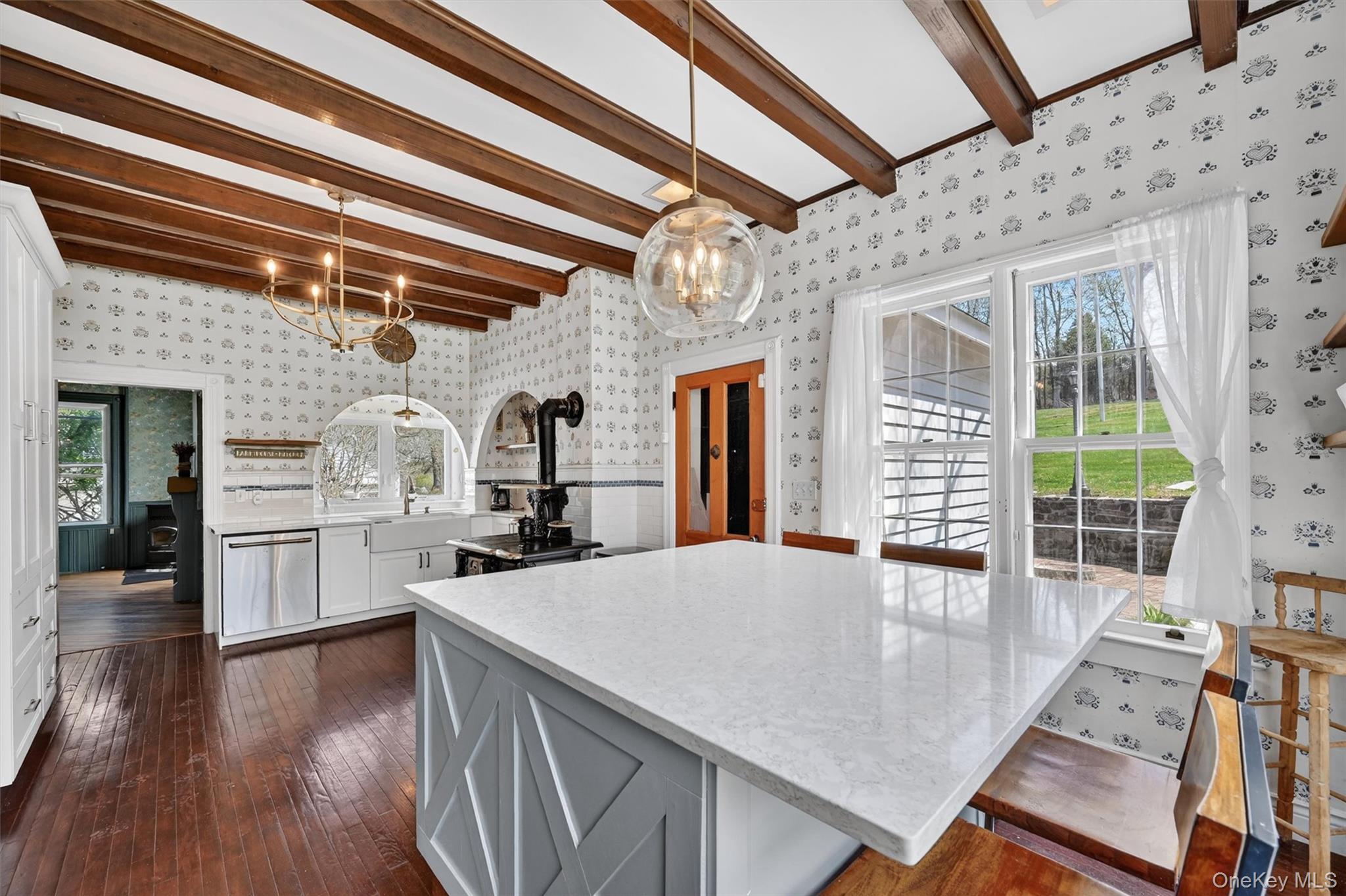 12 Perry Creek Road Washingtonville, NY 10992 - Photo 10 of 48 a open kitchen with a table and chairs