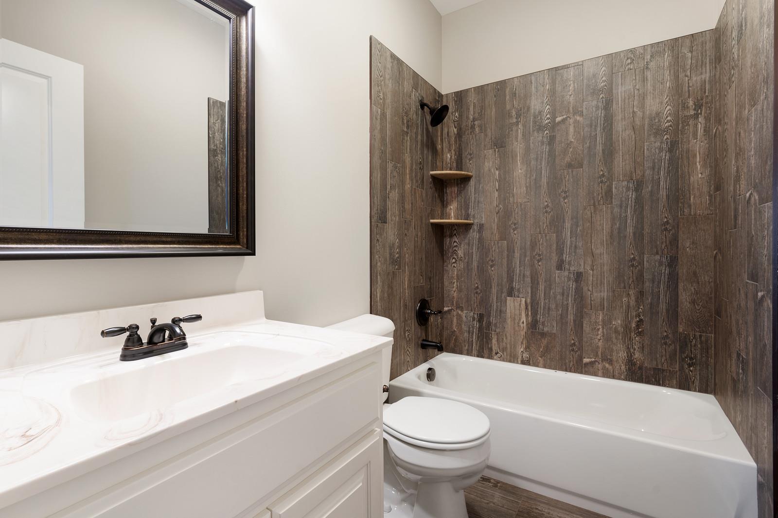 188 Fieldstone Lane Springfield, TN 37172 - Photo 17 of 30 a bathroom with a sink and a mirror