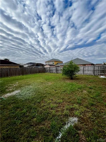 a view of a house with a big yard