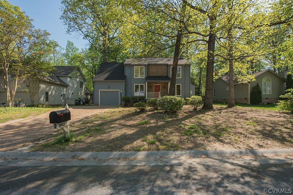 a backyard of a house with barbeque oven