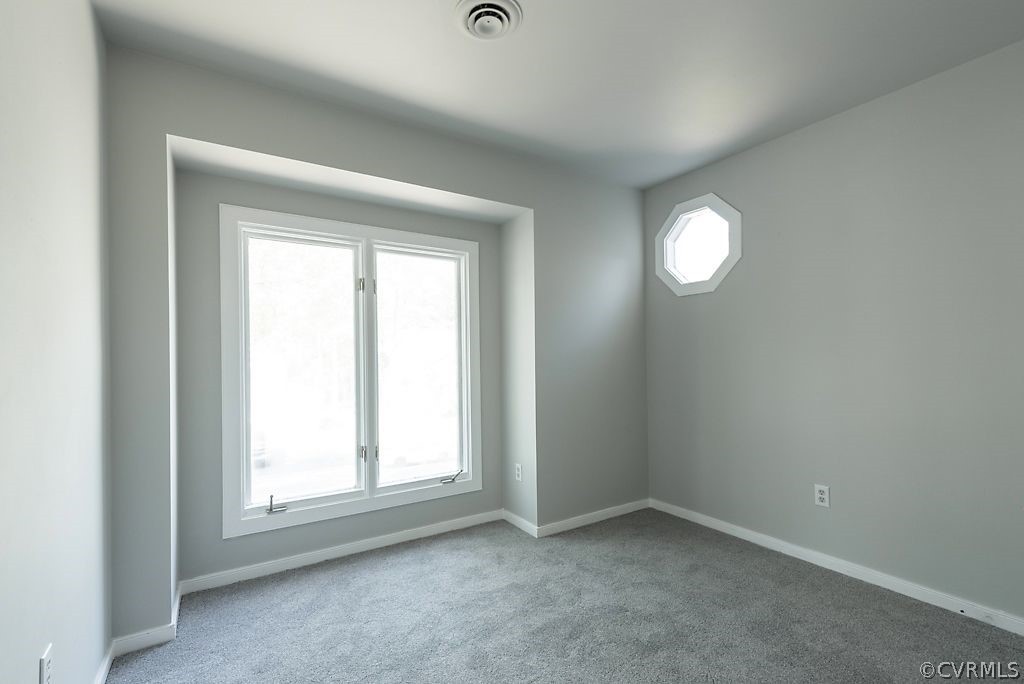 13805 Sandy Oak Road Chester, VA 23831 - Photo 21 of 28 an empty room with a window