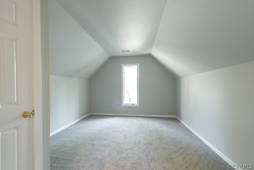 13805 Sandy Oak Road Chester, VA 23831 - Photo 22 of 28 an empty room with a empty space and windows