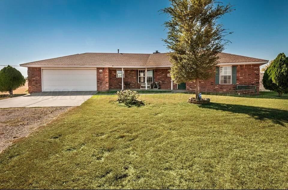 551 Lantana Road Amarillo, TX 79124 - Photo 1 of 1 a view of a house with a yard