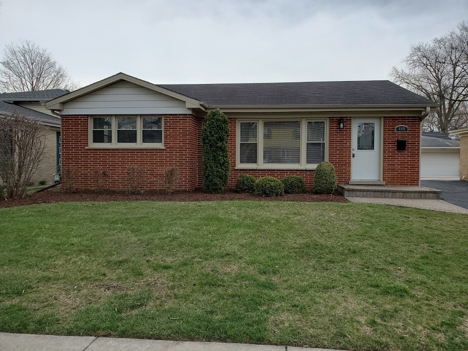 Restricted Address Arlington Heights, IL 60005 - Photo 1 of 1 a view of front of a house with a yard