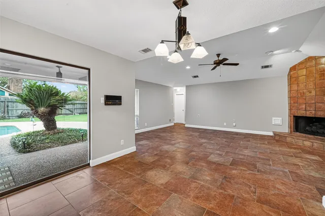 a view of a livingroom with a flat screen tv