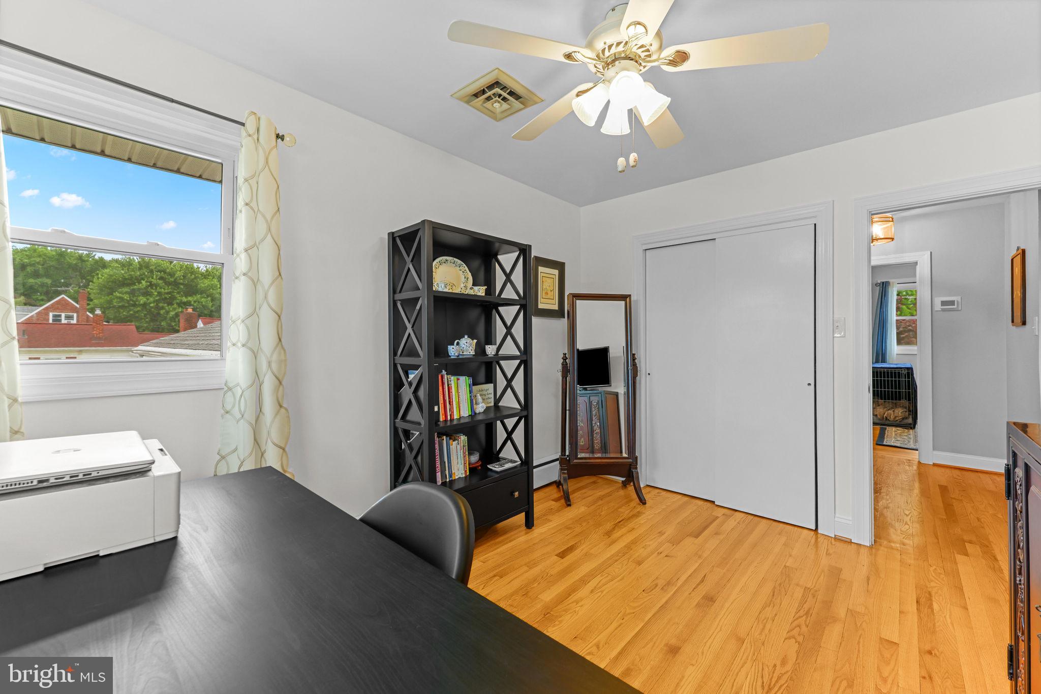 2902 Ritchie Avenue Baltimore, MD 21219 - Photo 26 of 43 a view of a room with furniture and a chandelier