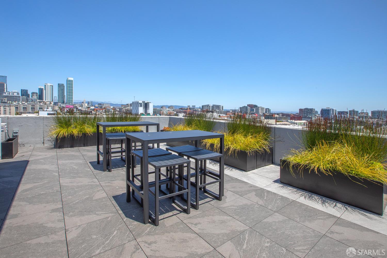 988 Harrison Street, Unit YH2 San Francisco, CA 94107 - Photo 16 of 17 a view of a chairs and table on the terrace