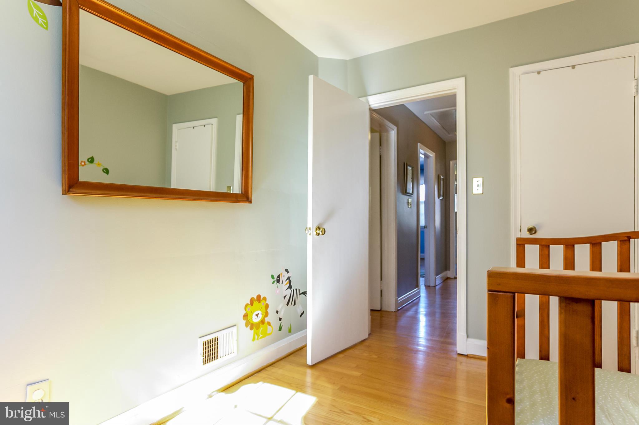 7120 Heathfield Road Baltimore, MD 21212 - Photo 18 of 29 a view of an entryway with wooden floor