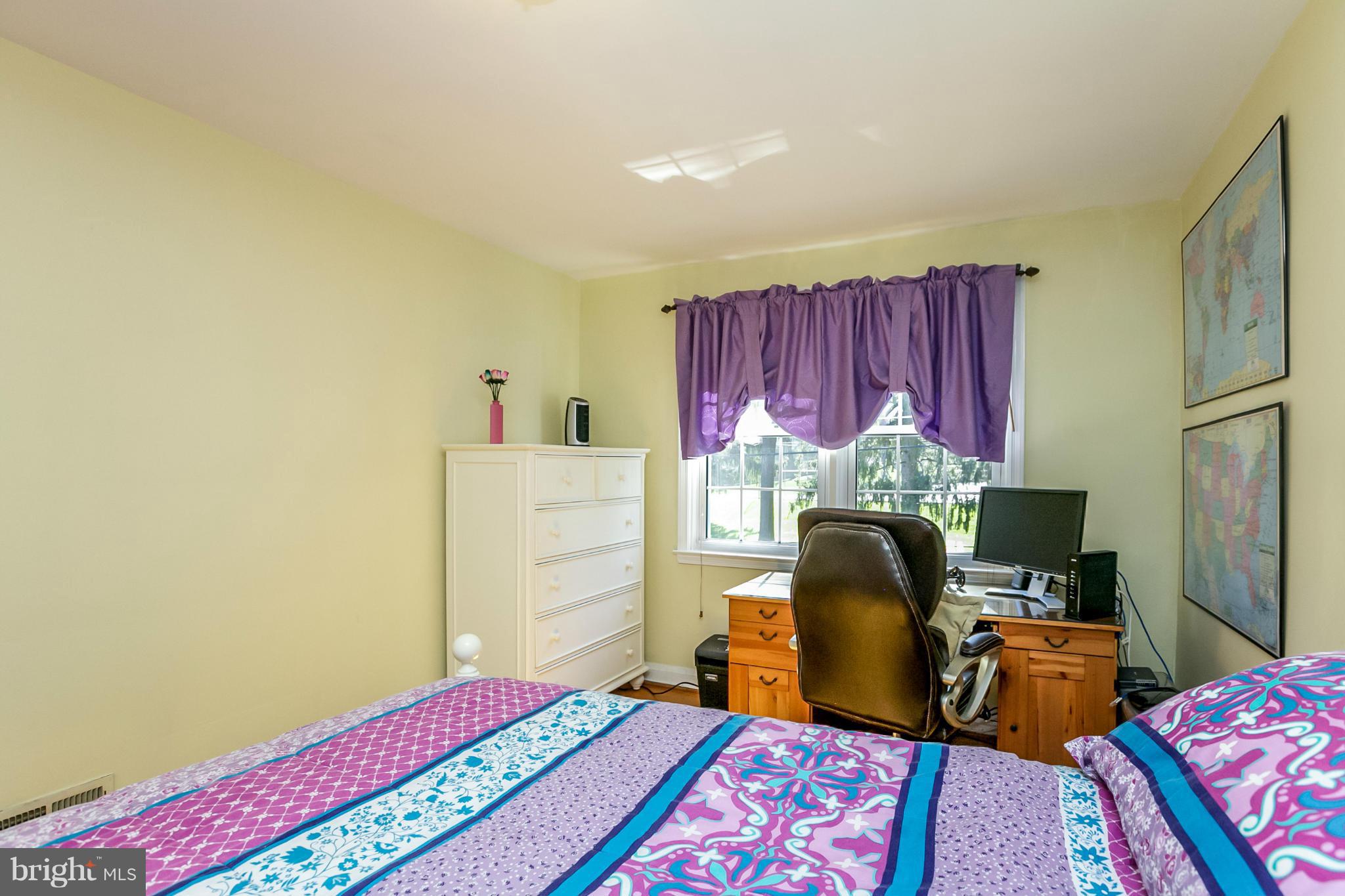7120 Heathfield Road Baltimore, MD 21212 - Photo 22 of 29 a bedroom with furniture and a bed