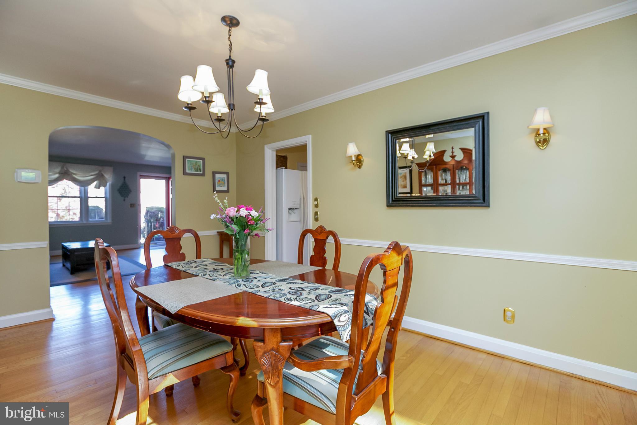 7120 Heathfield Road Baltimore, MD 21212 - Photo 9 of 29 a view of a dining room with furniture and wooden floor