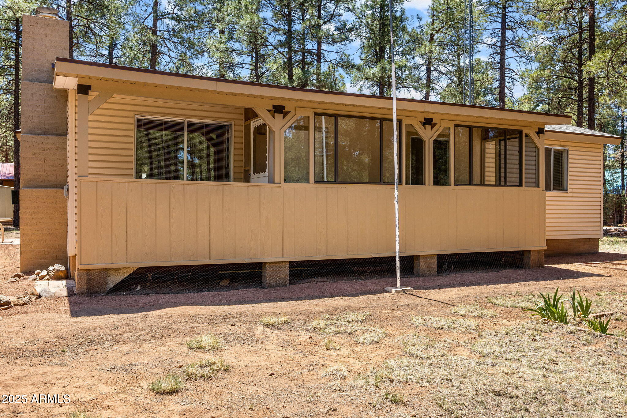 2127 Pony Road Overgaard, AZ 85933 - Photo 23 of 30 a view of a house with a snow