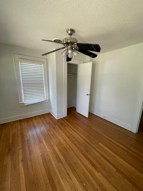 207 West 39th Street, Unit B Austin, TX 78751 - Photo 12 of 20 a view of a room with wooden floor and white walls