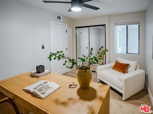 a view of a workspace with furniture