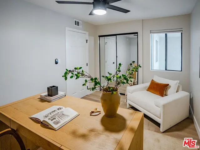 a view of a workspace with furniture