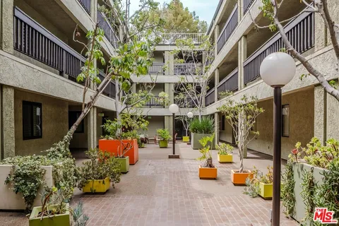 a front view of a building with street view