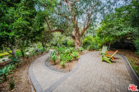 a view of a swimming pool with a yard
