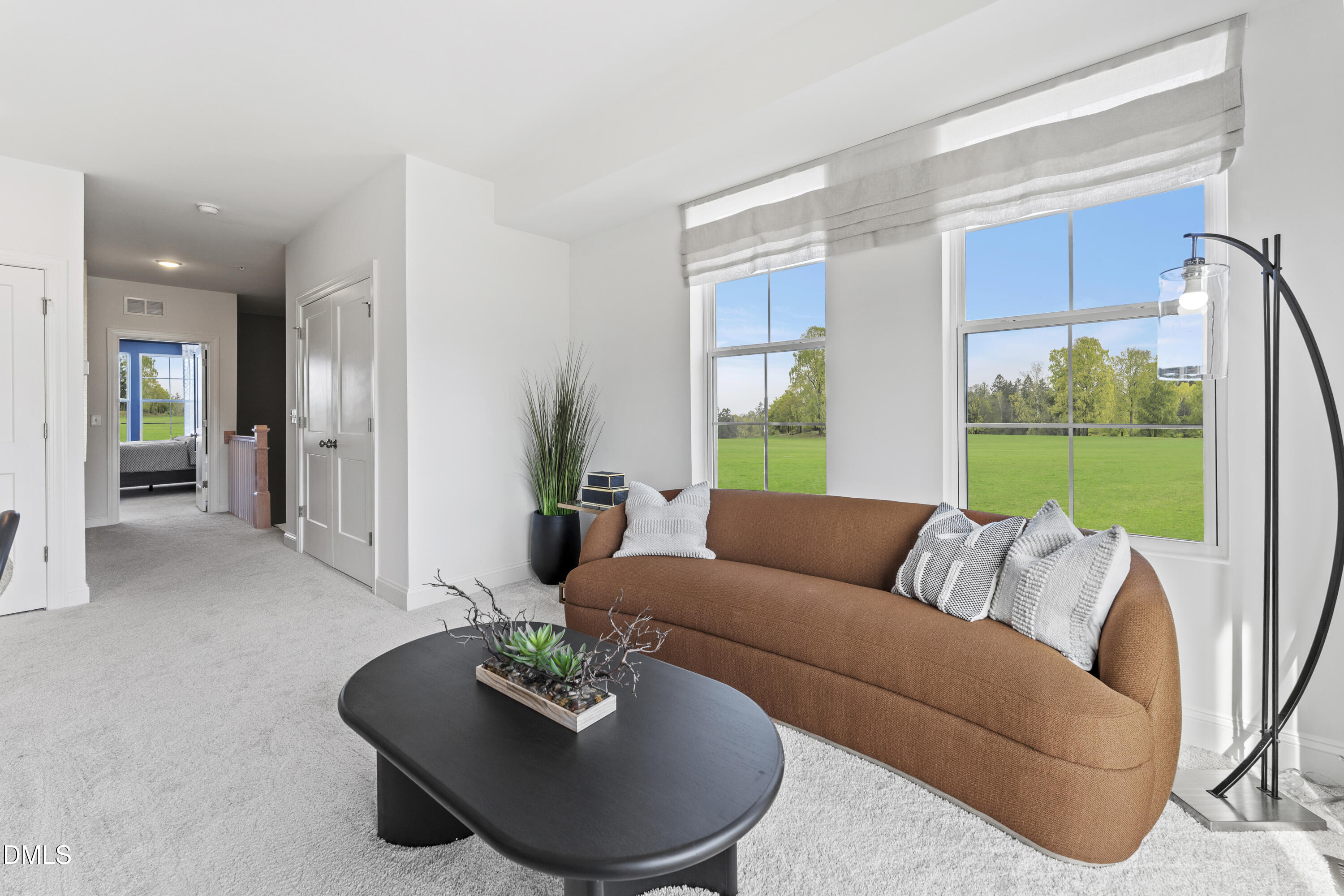 620 Hedrick Rdg Road, Unit 114 Cary, NC 27519 - Photo 17 of 29 a living room with furniture and a large window