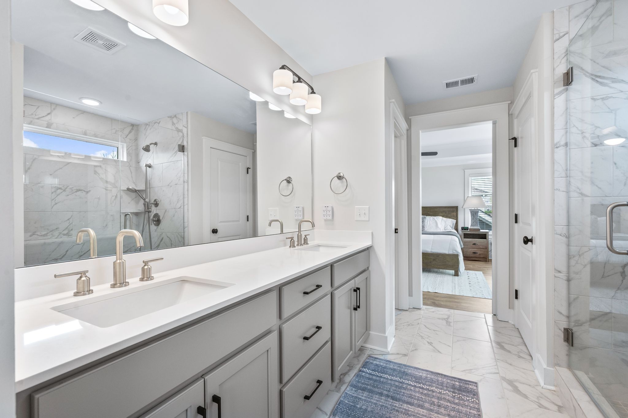 141 Foxhall Dr Spring Hill Spring Hill, TN 37174 - Photo 14 of 31 a spacious bathroom with a shower sink double and mirror