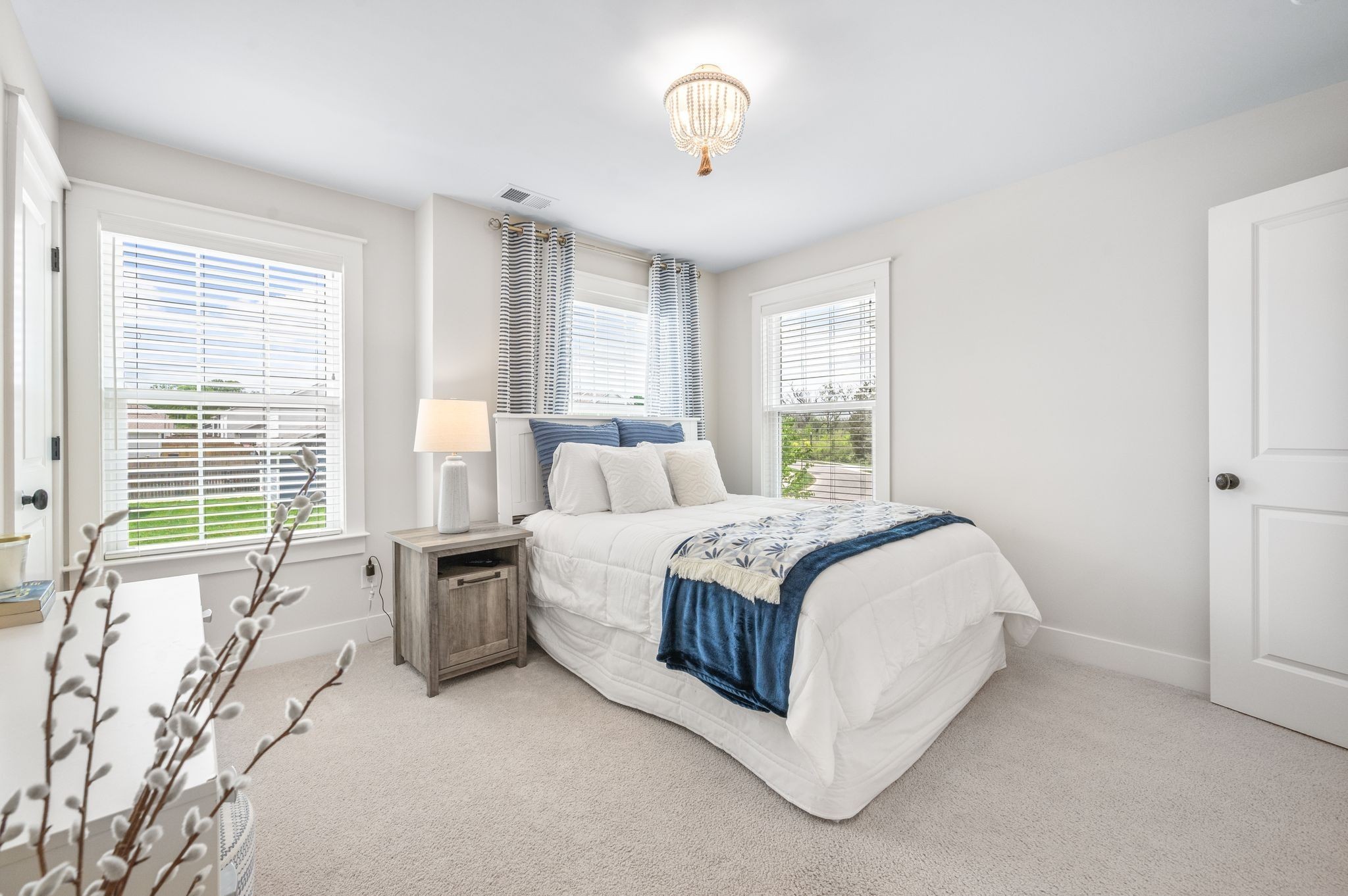 141 Foxhall Dr Spring Hill Spring Hill, TN 37174 - Photo 18 of 31 a spacious bedroom with a bed and a large window