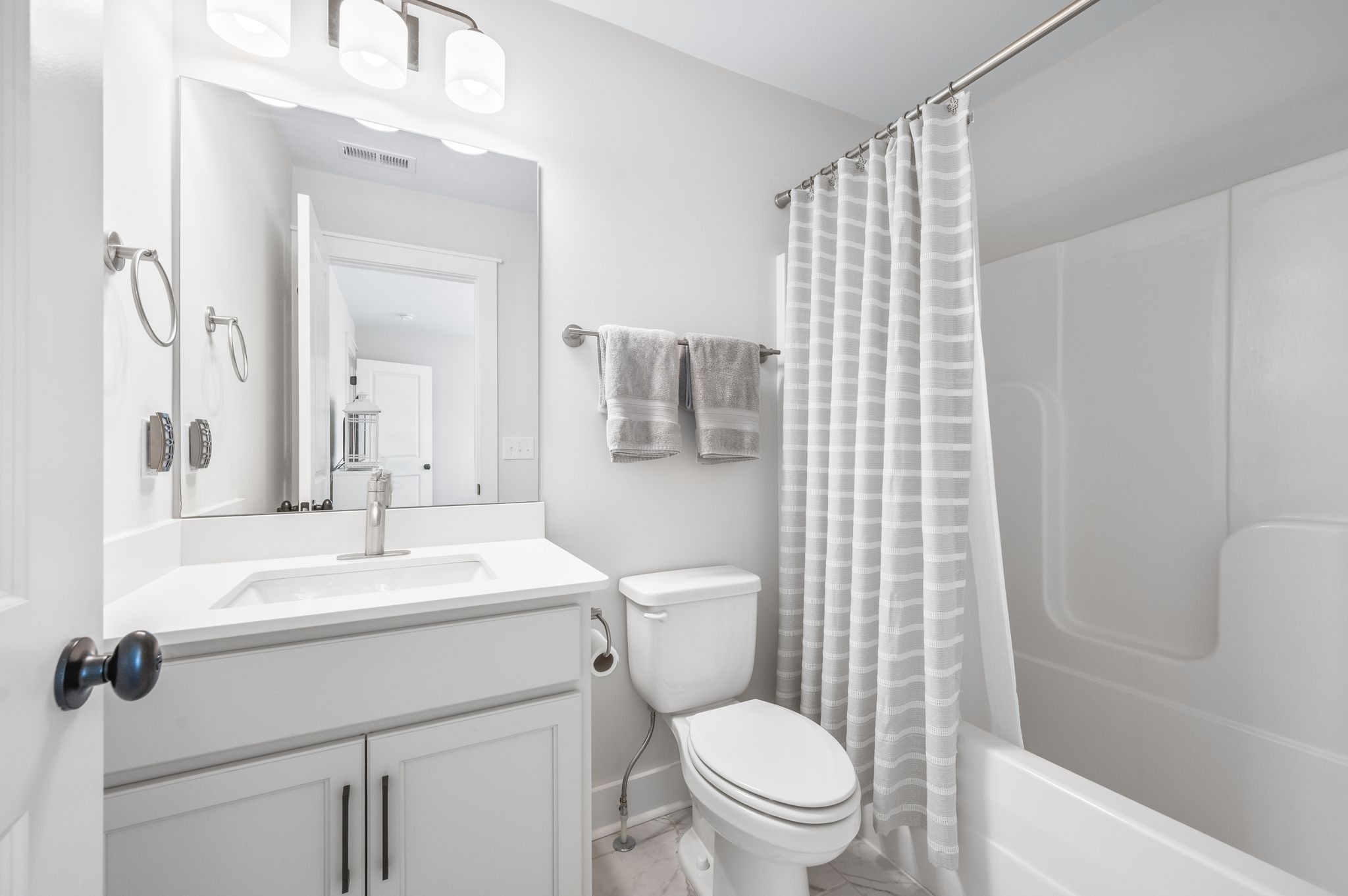 141 Foxhall Dr Spring Hill Spring Hill, TN 37174 - Photo 19 of 31 a bathroom with a sink a toilet and shower