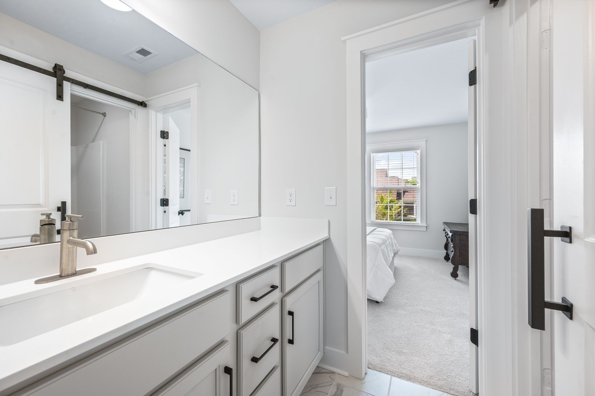 141 Foxhall Dr Spring Hill Spring Hill, TN 37174 - Photo 21 of 31 a bathroom with a sink and mirror with toilet