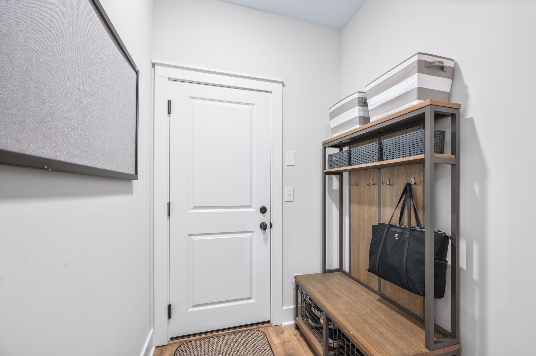 141 Foxhall Dr Spring Hill Spring Hill, TN 37174 - Photo 10 of 31 a view of a hallway with a closet and mirror