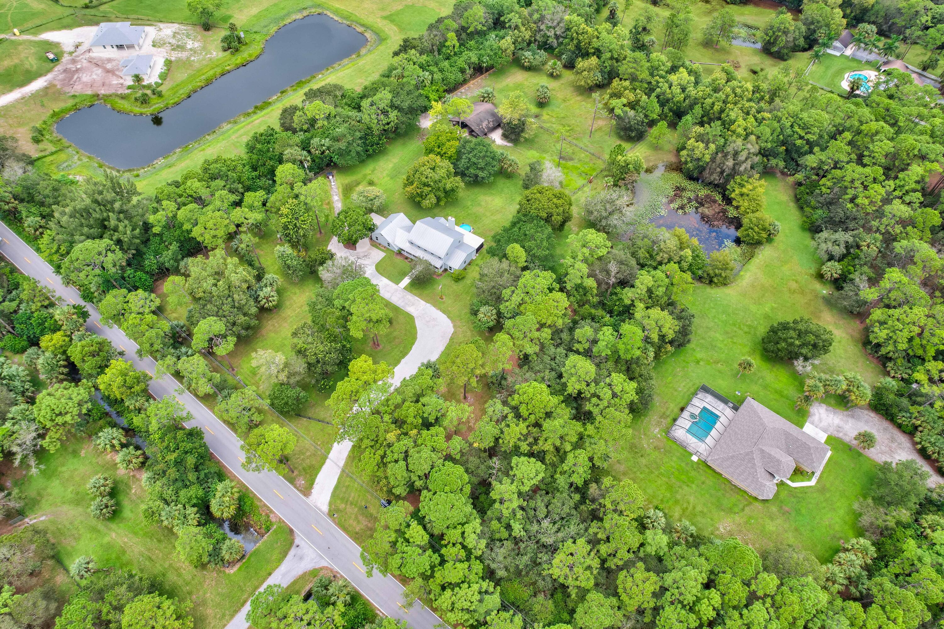 10719 Randolph Siding Road Jupiter, FL 33478 - Photo 11 of 100 09_dji_0256_57_58_59_60