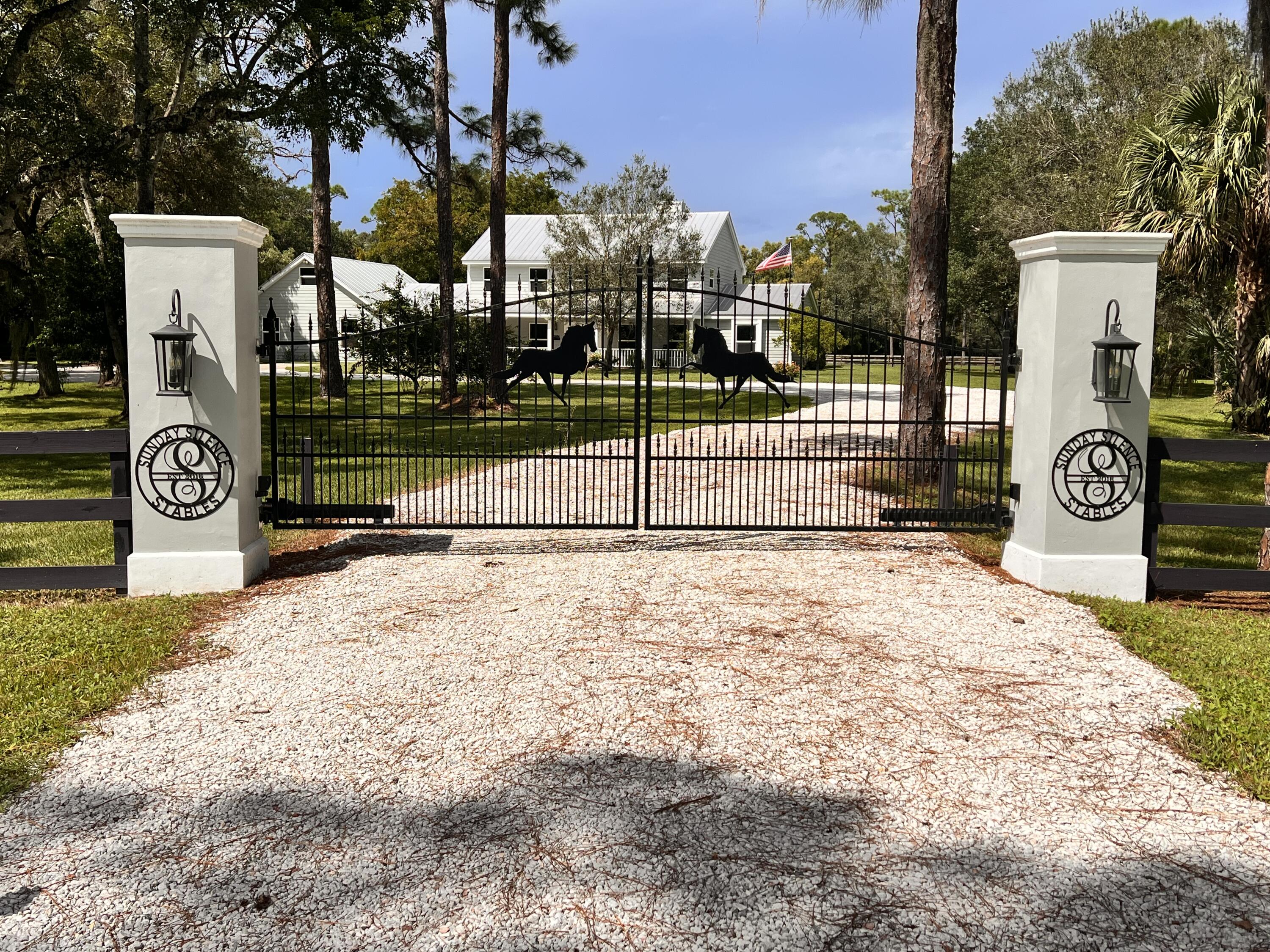 10719 Randolph Siding Road Jupiter, FL 33478 - Photo 2 of 100 2023-09-30 14.13.01