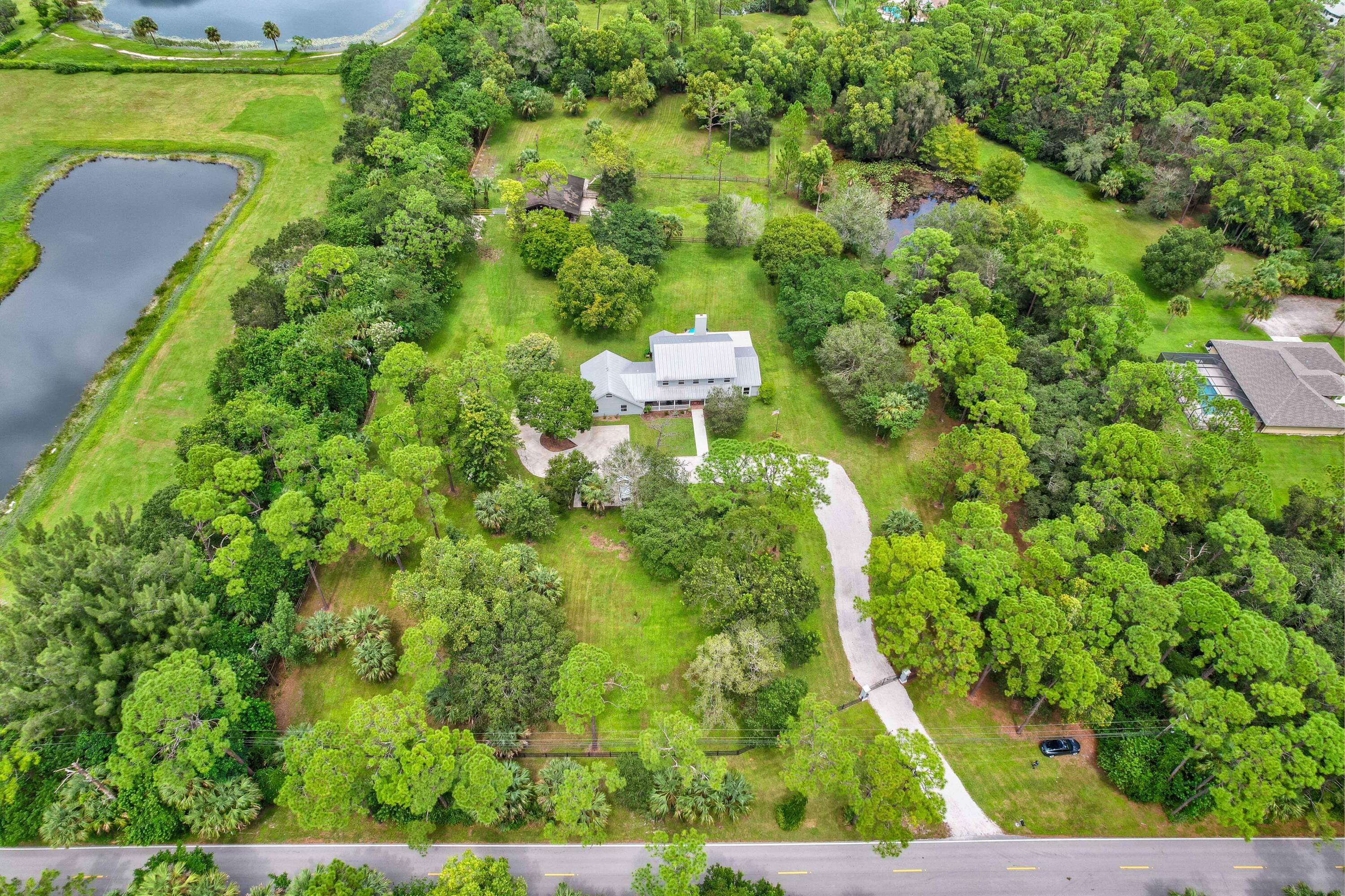 10719 Randolph Siding Road Jupiter, FL 33478 - Photo 3 of 100 01_dji_0216_17_18_19_20