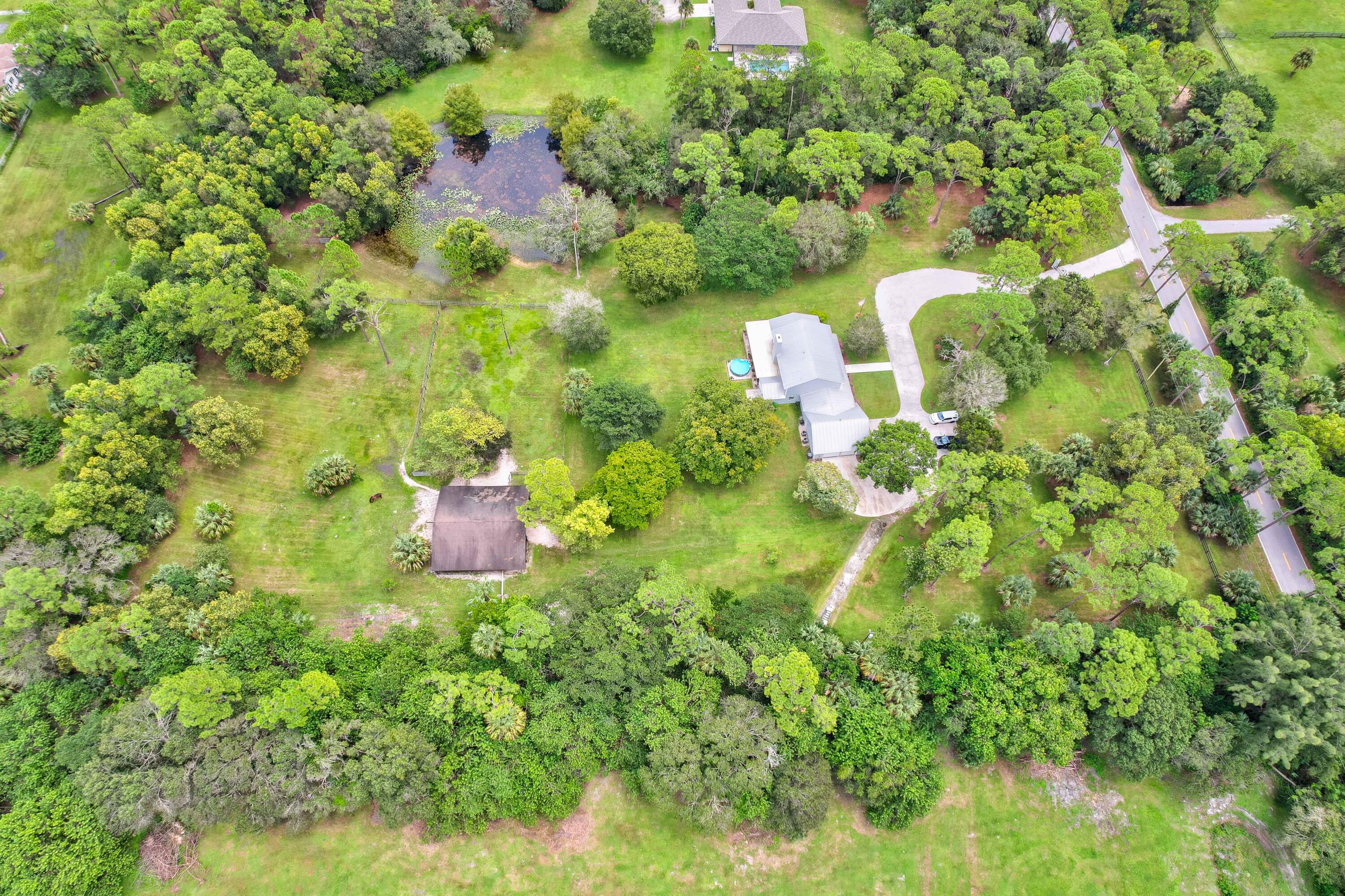 10719 Randolph Siding Road Jupiter, FL 33478 - Photo 5 of 100 03_dji_0226_27_28_29_30