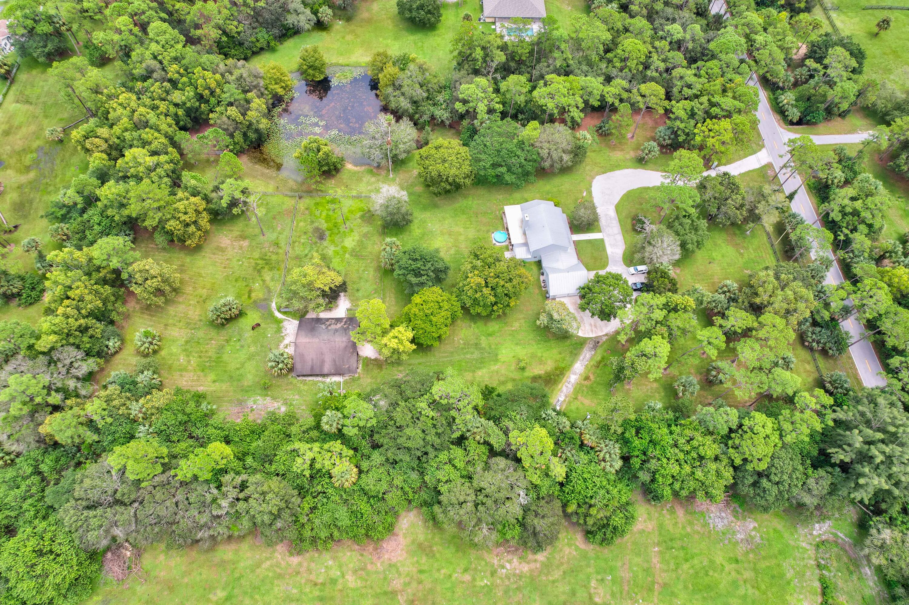 10719 Randolph Siding Road Jupiter, FL 33478 - Photo 6 of 100 04_dji_0231_2_3_4_5